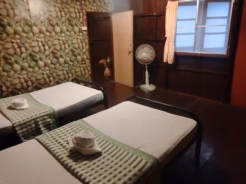 Single Bed in Dormitory Room