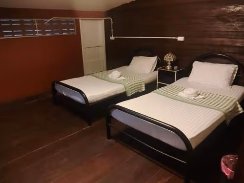 Single Bed in Dormitory Room