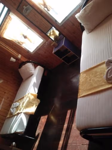 Single Bed in Dormitory Room