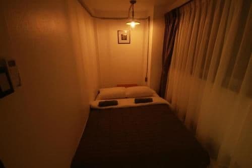 Queen Room with Shared Bathroom