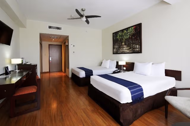 Room SUPERIOR TWO DOUBLE BEDS