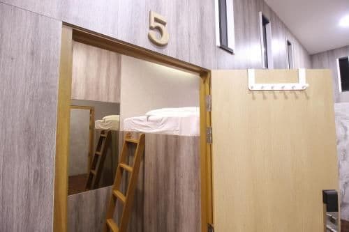 Private Double Bed Capsule Room with Shared Bathroom