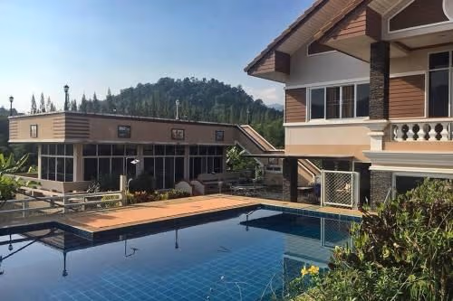 Six-Bedroom House