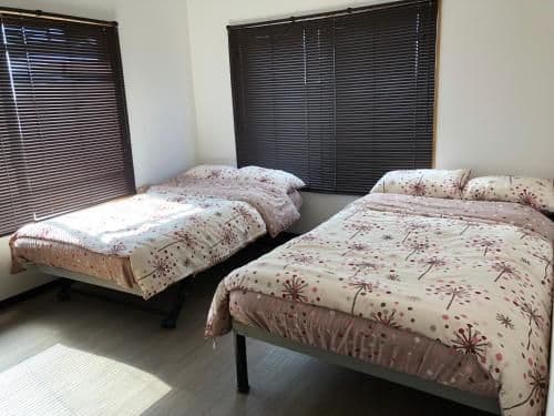Twin Bedroom with Shared Bathroom