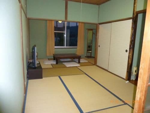 Quadruple Room with Private Bathroom