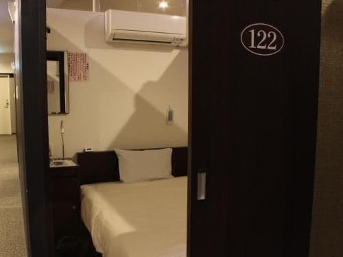 Bed in Male Dormitory Room