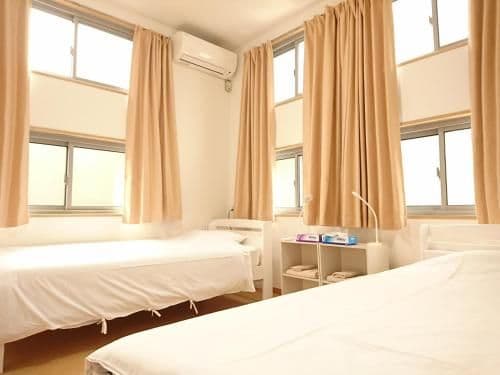 Female Only - Double or Twin Room with Extra Bed with Shared Shower and Toilet