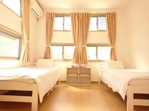 Female Only - Double or Twin Room with Extra Bed with Shared Shower and Toilet