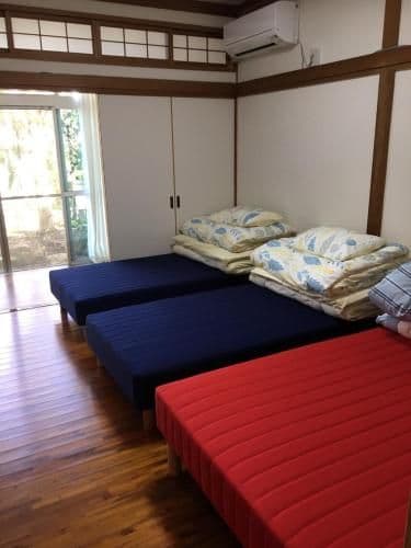 Quadruple Room with 2 Single Beds and 1 Double Bed