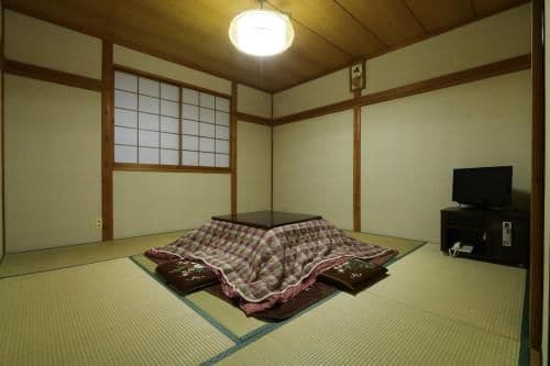 Quadruple Room with Shared Bathroom