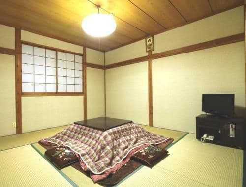 Quadruple Room with Shared Bathroom