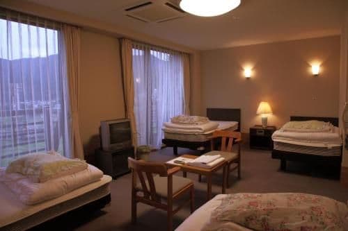 Quadruple Room with Shared Bathroom