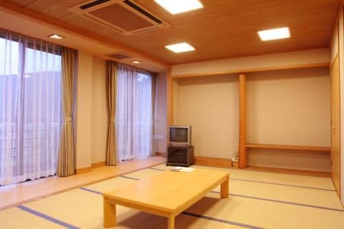 Japanese-Style Family Room with Shared Bathroom