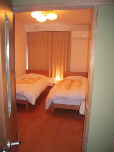 Twin Room with Shared Bathroom