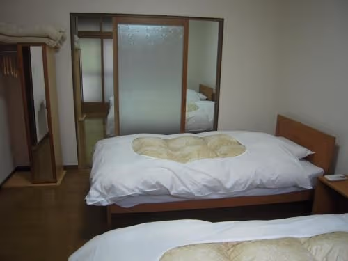 Quadruple Room with Shared Bathroom (2-4 Adults)