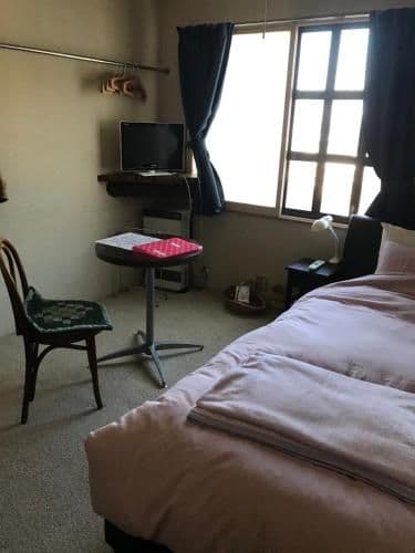 Single Room with Shared Bathroom