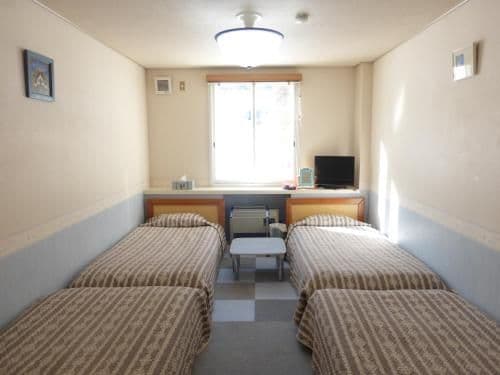 Quadruple Room with Shared Bathroom