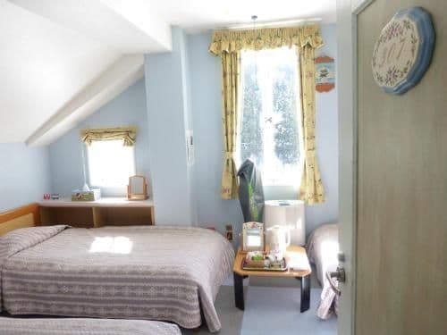 Quadruple Room with Shared Bathroom