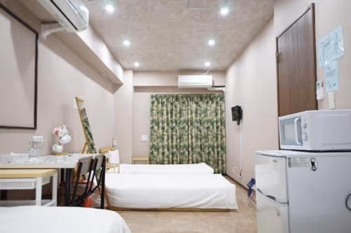 Quadruple Room with Shared Bathroom