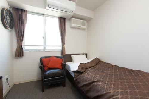 Single Room with Shared Shower and Toilet