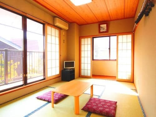 Japanese-Style Family Room with Shared Bathroom