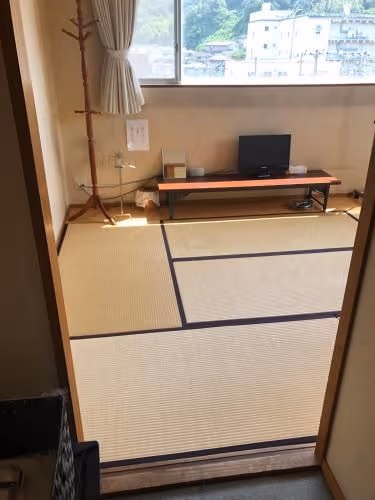 Quadruple Room with Shared Bathroom
