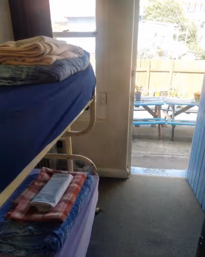 Cabin Bunk Room with Shared Bathroom