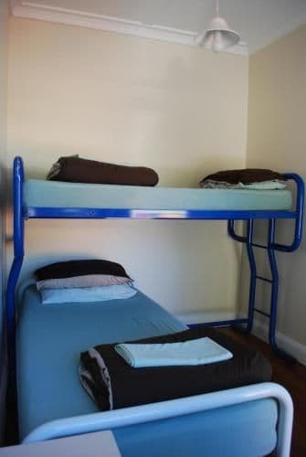 Cabin Bunk Room with Shared Bathroom