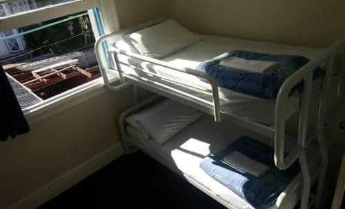 Twin Bunk Room with Shared Bathroom