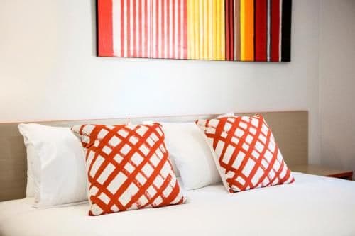 Compact King Room with Shared Bathroom and Free Welcome Drink For Two Guests