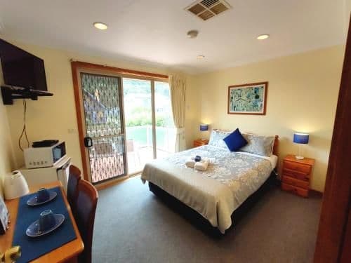 Queen Room with Shared Bathroom