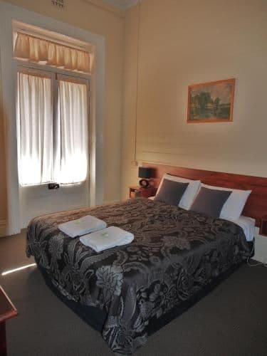 Queen Room with Shared Bathroom