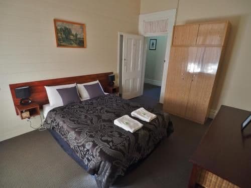 Queen Room with Shared Bathroom