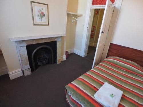 Queen Room with Shared Bathroom
