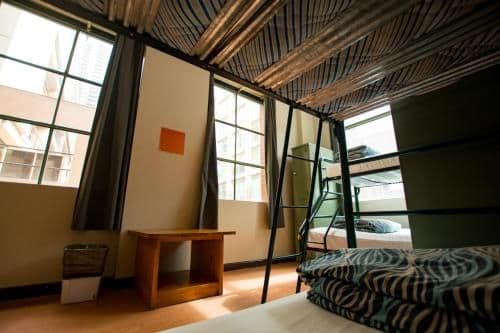 Bed in 4-Bed Female Dormitory Room with Shared Bathroom