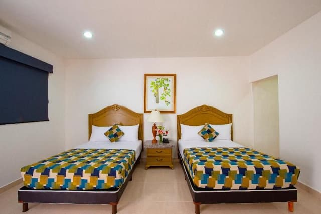 DOUBLE TWO DOUBLE BEDS