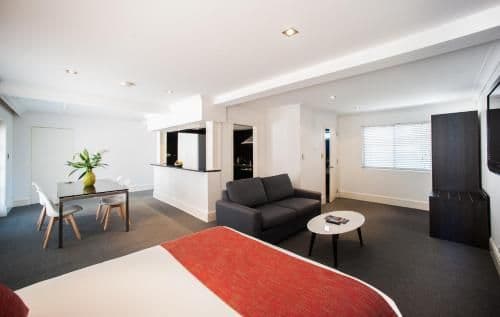 Deluxe Queen Suite with Kitchen and Pool View