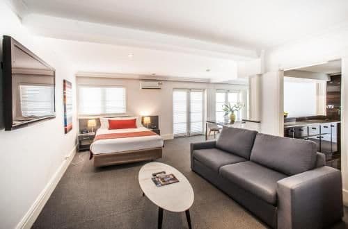 Deluxe Queen Suite with Kitchen and Pool View