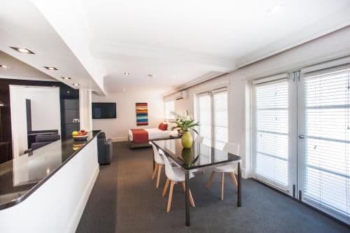 Deluxe Queen Suite with Kitchen and Pool View