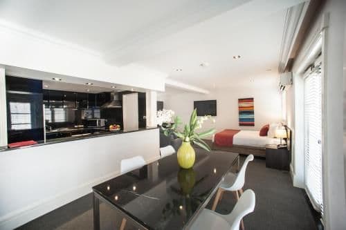 Deluxe Queen Suite with Kitchen and Pool View