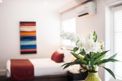 Deluxe Queen Suite with Kitchen and Pool View