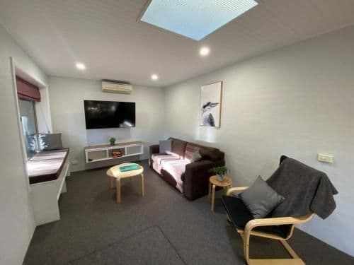 Superior Cottage with One Queen Bed and Two Single Beds (4 Guests)