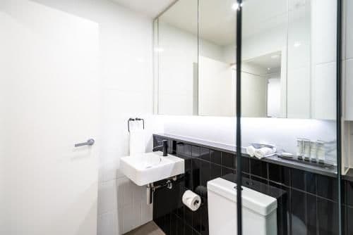 Two-Bedroom Executive Apartment with Balcony and City Views