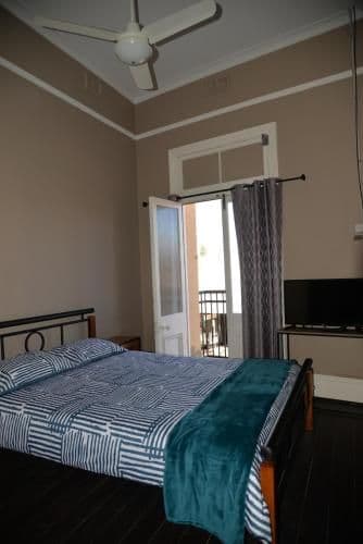 Queen Room with Shared Bathroom