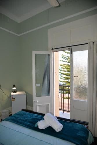 Queen Room with Shared Bathroom