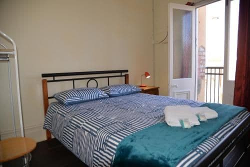 Queen Room with Shared Bathroom