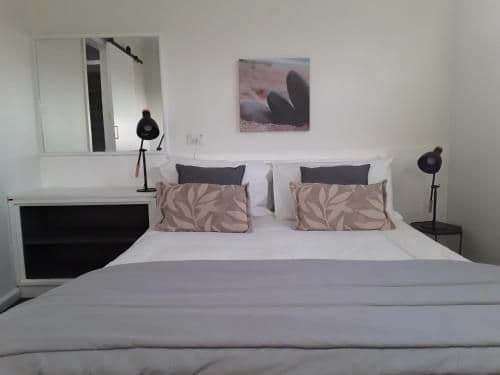 One-Bedroom Apartment with Balcony and Sea and Golf Course Views