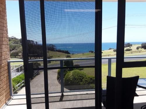 One-Bedroom Apartment with Balcony and Sea and Golf Course Views