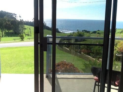 One-Bedroom Apartment with Balcony and Sea and Golf Course Views