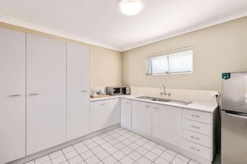 Family Room with One Queen Bed and Two Single Beds - Non Smoking